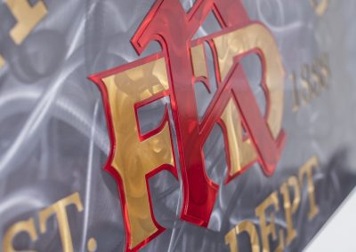 Closeup of a custom metal sign for a local fire department